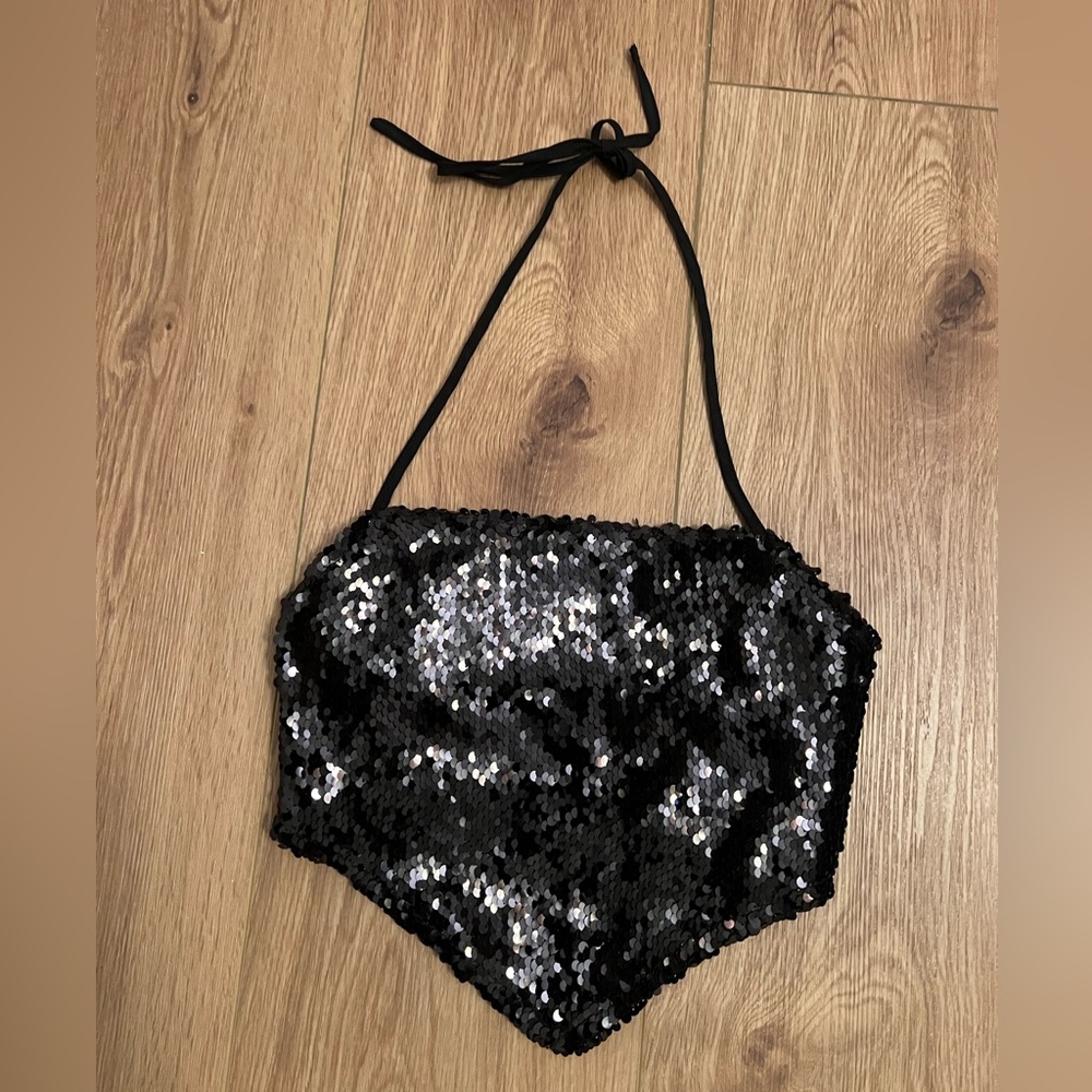 Black going out top